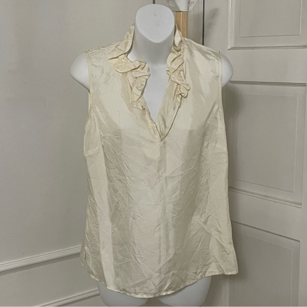 Elizabeth‎ Mckay Sleeveless Silk Blouse in Cream with a ruffle neck detail